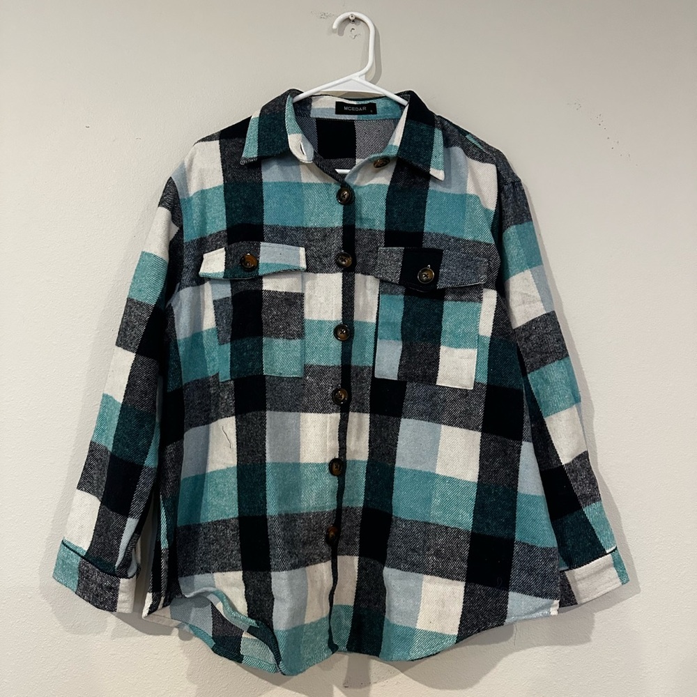 Women’s Mcedar teal, black, grey and white women’s flannel shirt in a size small